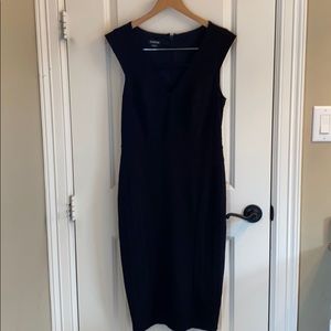 Bebe Black fitted midi dress size medium